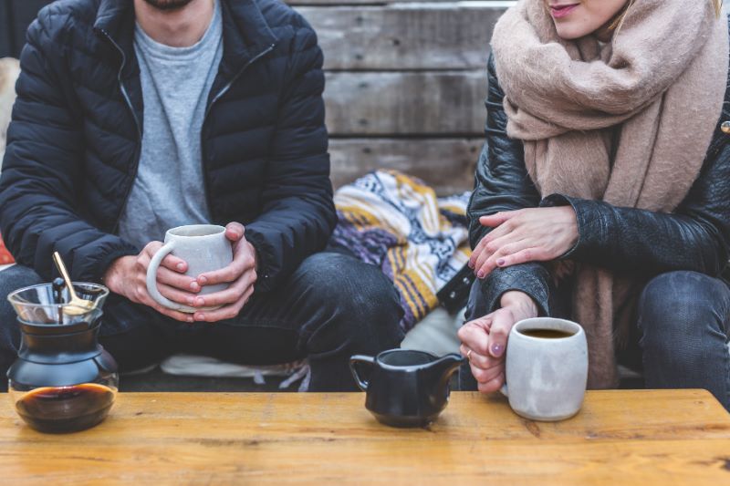 Two People Drinking Coffee